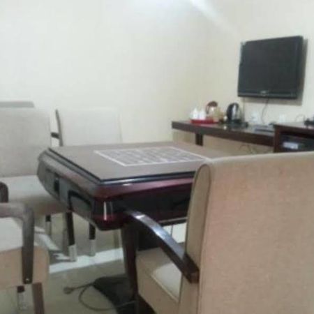 Xinhang Hotel Urumqi Bagian luar foto