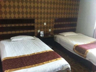 Xinhang Hotel Urumqi Bagian luar foto
